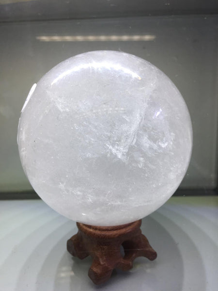 Clear Quartz Sphere with a touch of garden